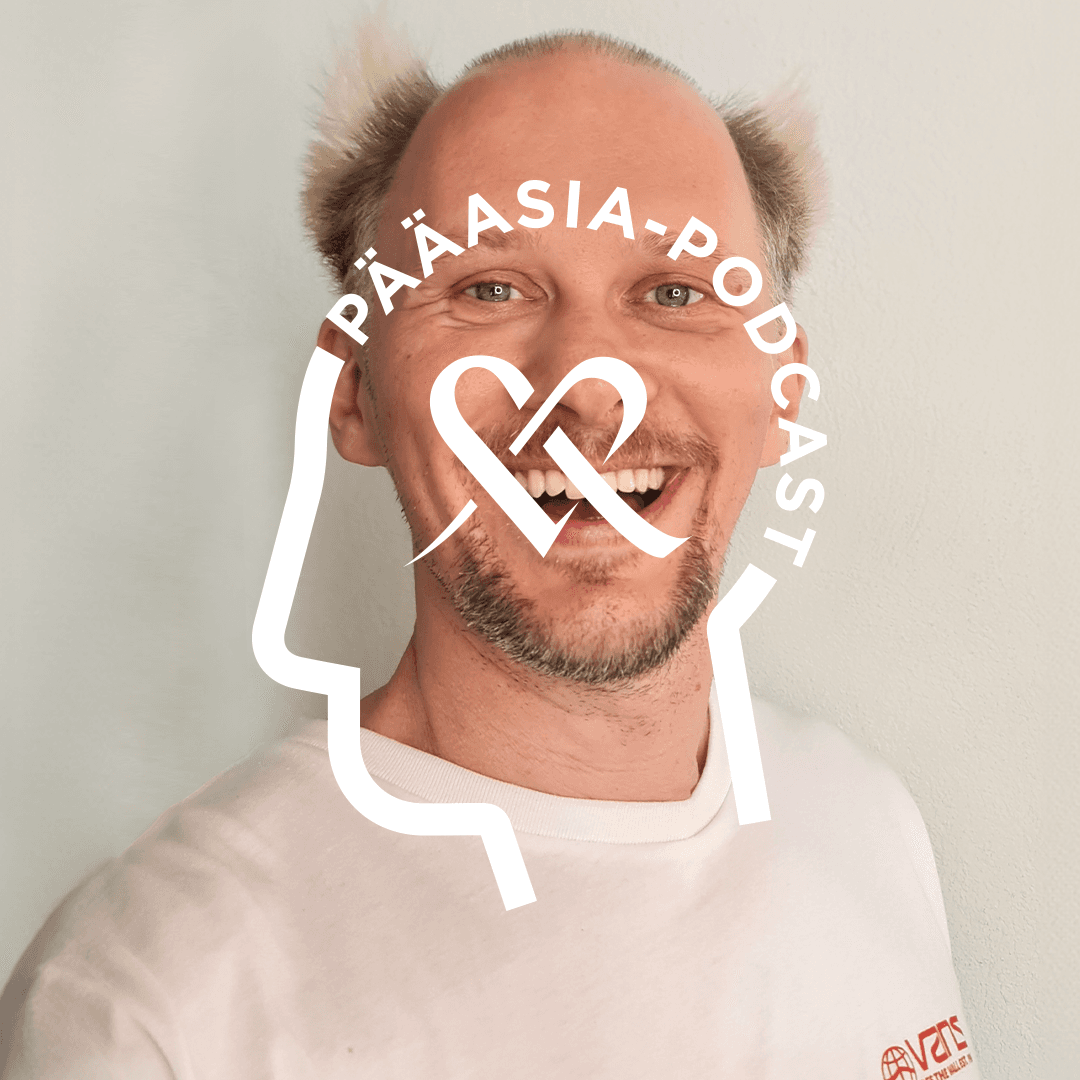 Jarno Laasala poses for the camera in a close-up shot. Overlaid on the image is the *Pääasia* podcast logo, featuring text shaped like a human head and the Mehiläinen heart symbol in the center.
